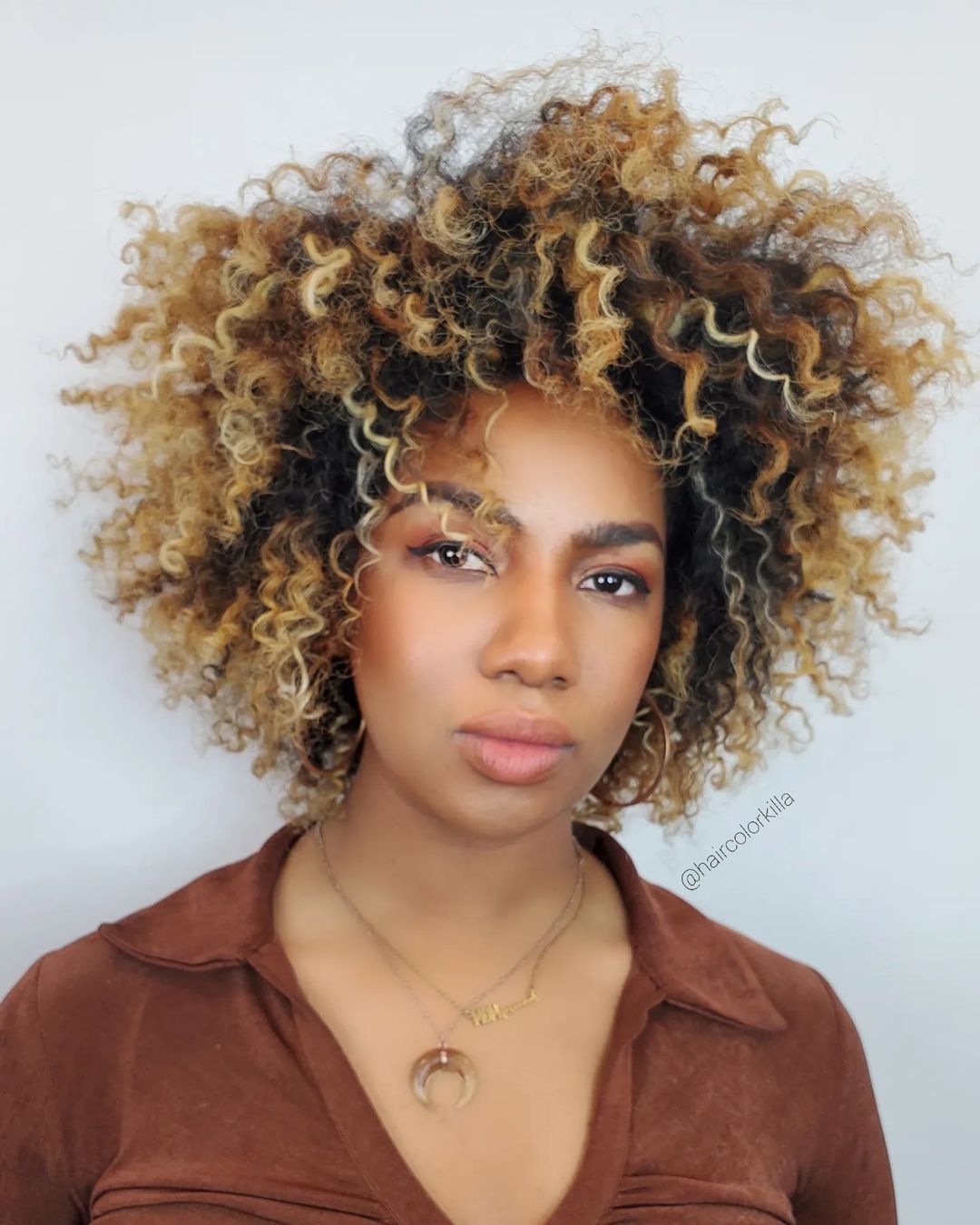 Fun Afro with Blonde Highlights